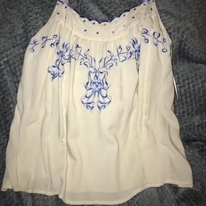 Summer time dressy tank style blouse.